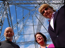 Glastonbury organizer Michael Eavis, Camelot artist Terri Hogan and PTTP Managing Director JJ Edgell meet under the famous pyramid stage during the 2008 Glastonbury festival preparations.